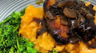 honey mustard sausages with sweet potatoe mash and sticky red onion gravy